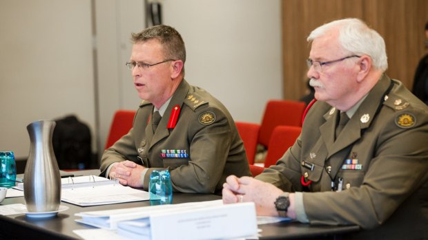 Department of Defence witnesses Colonel Griffith Thomas and Major Phil Rutherford.