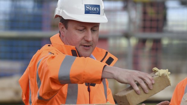 One brick at a time: British Prime Minister and Conservative Party leader David Cameron kept busy until the end of his campaign.