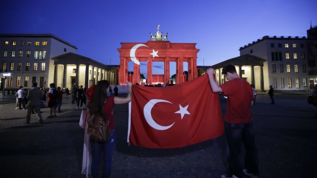 The Brandenburg Gate in Berlin illuminated with the Turkish flag in solidarity. 