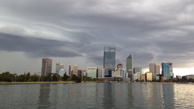 Storm clouds loom over Perth city.