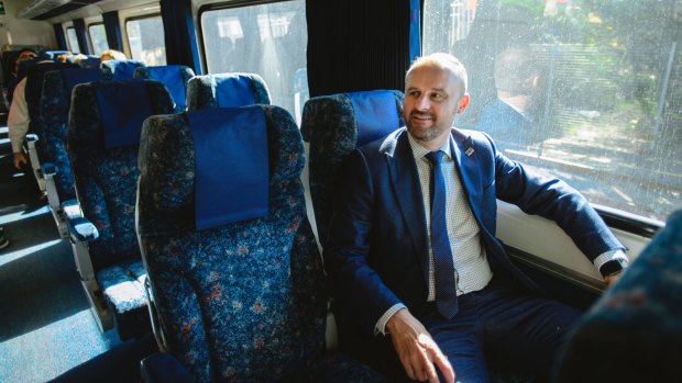 ACT Chief Minister Andrew Barr aboard a train to Sydney where he will meet with NSW Minister for Infrastructure Andrew Constance.