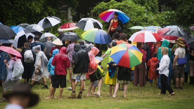 Umbrellas were the order of the day at the Woodford Folk Festival on Sunday. 