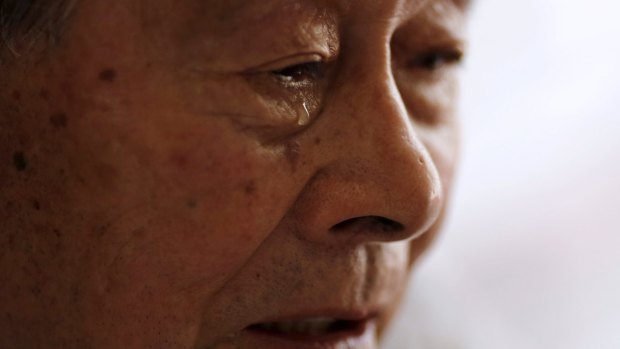 A tear falls from the eye of Yoshiteru Kohata, a 86-year-old Nagasaki atomic bombing survivor and retired school teacher, who returned to his home region of Fukushima after World War II.