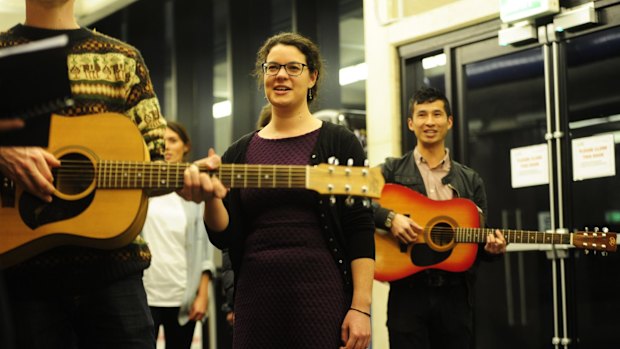 Songs of joy: Olivia Swift leading CHOIR Canberra at the ANU School of Music.