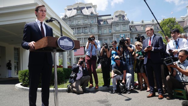 Kushner speaks to reporters outside the White House.