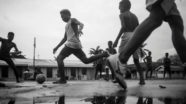 Sean Davey, Boys play a game of park soccer in Honiara, 2017, in Next Generation: Solomon Islands After RAMSI at Photoaccess.