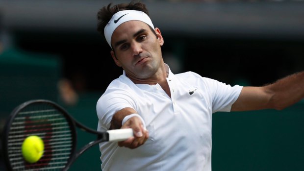 Roger Federer returns to Bulgaria's Grigor Dimitrov during their day seven match.