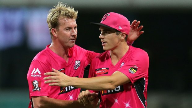 Pace setters: Sixers Brett Lee (left) and Sean Abbott celebrate after combining for a wicket. 