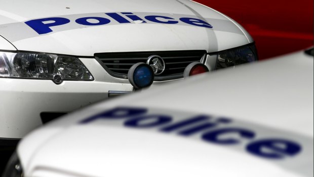 Police are investigating reports of a man in a red sedan approaching girls in the Mentone area. 