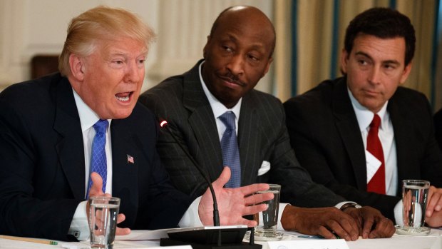 Trump, left,meeting with manufacturing executives in February, including Kenneth Frazier, centre.