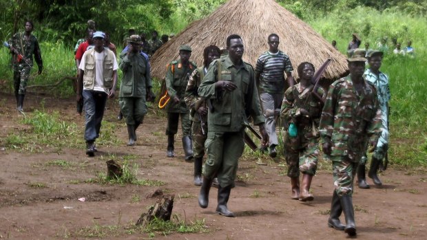 A column of Lord's Resistance Army fighters at Ri-Kwangba on southern Sudan's border with the Democratic Republic of Congo in 2006.