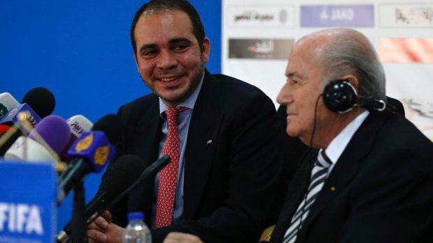 Battle lines: Jordanian royal Prince Ali Bin Al Hussein, left, with FIFA President Sepp Blatter.