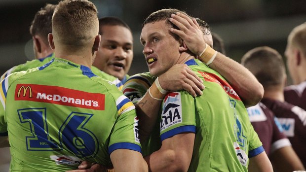Jack Wighton is congratulated by Raiders teammates on Friday night.