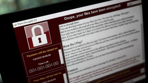 A lock screen from a cyber attack warns that data files have been encrypted.