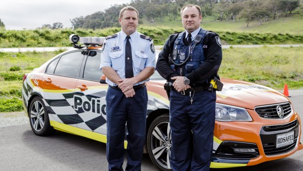 Traffic Operations Station Sergeant Rod Anderson, left, and Road Safety Operations Team Sergeant Stuart Howes. 