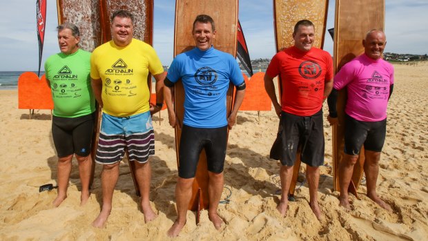 Premier Mike Baird with fellow competitors for the Vintage Wood heat at the 2015 MalJam surfing competition.