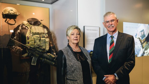Equipment worn by Corporal Cameron Baird VC on display at the Australia War Memorial. Baird's parents, Doug and Kaye Baird with the equipment.