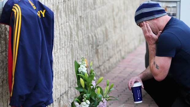 Devastated fans gathered at AAMI Stadium to pay tribute.