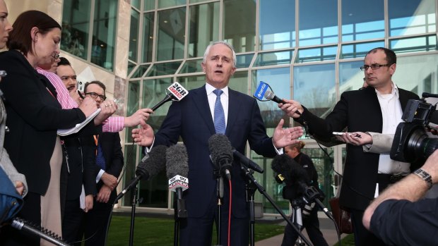 Communications Minister Malcolm Turnbull arrives to address the media and announce that he is challenging Prime Minister Tony Abbott for the leadership.