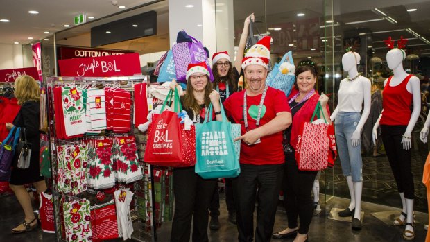 Best and Less staff are excited with all the hype that goes with the biggest retailing event of the year.
From left, Julia Zordzik, Jaydel Clarke, Store manager David Layton, and Sonia Downie.