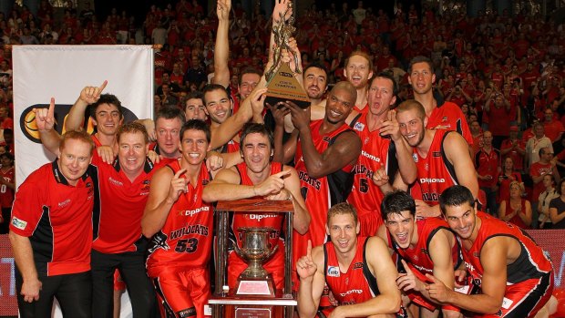 Championship pedigree: The Wildcats pose with the NBL trophy after defeating the Wollongong Hawks during game three of the 2010 grand final series in Perth.
