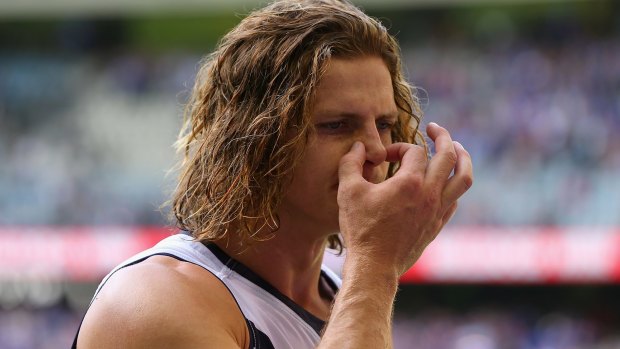 Nat Fyfe looks dejected after the Dockers put in a stinker against the Bulldogs.