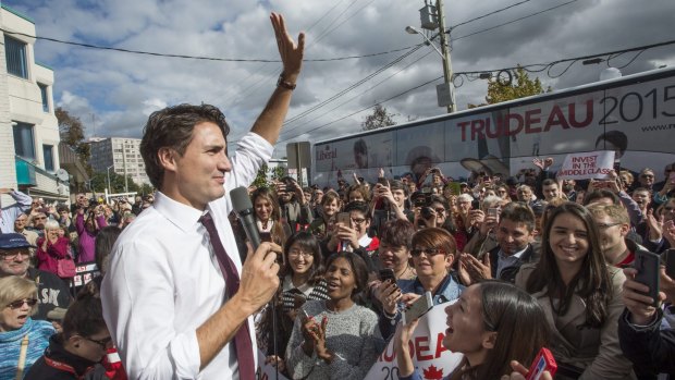 Trudeaumania mark II: New Canadian Prime Minister waves to supporters on a campaign stop last week. 