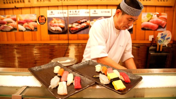 A sushi restaurant at the famous Tsukiji fish market, Tokyo.