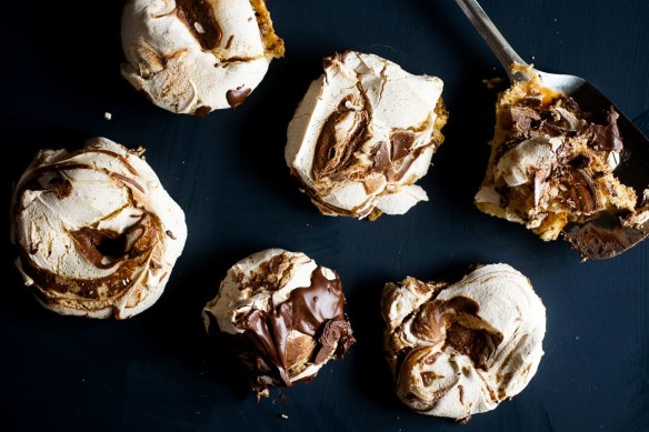 Choc-dipped chocolate ripple meringues.