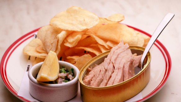 Tin of tuna belly with potato crisps at Neptune. 