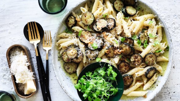 Pasta topped with seasoned zucchini and butter. 