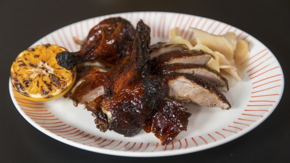Slow-roasted duck with grilled lemon and pickled ginger.
