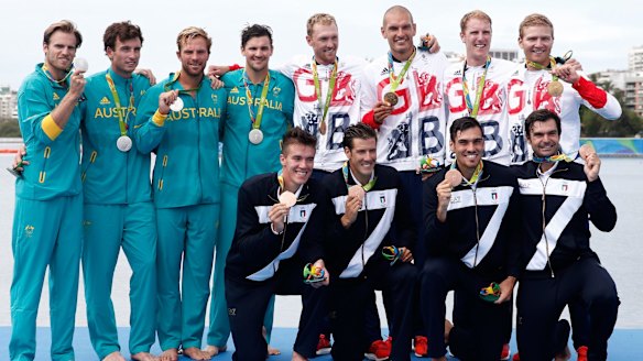 Size matters: Silver medalists Australia, gold medalists Great Britain and bronze medalists Italy pose after the ceremony.