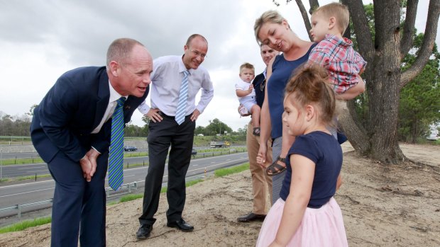 Premier Campbell Newman campaigns at North Lakes, speaking with the Petersen family, Ben, Flynn, Harry, Rosalind and Stella.