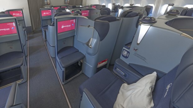 Some business class seats are exposed to the aisle.