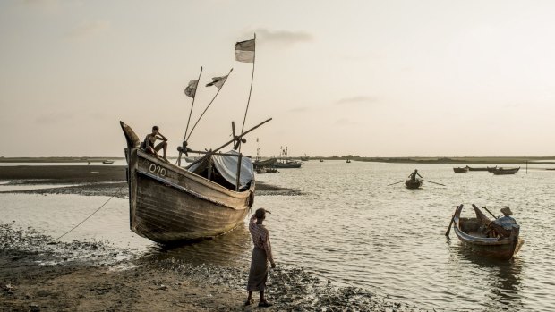 Fishing boats in Thae Chaung Cove, near several refugee camps on the coast of Rakhine State.