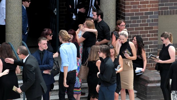 Family and friends arrive at Jessica Falkholt's funeral. 