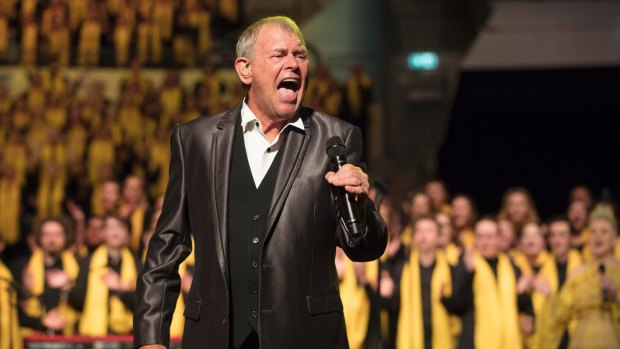 John Farnham performs with at the Queensland Music Festival concert at South Bank Piazza where 2500 singers gathered to sing for change.