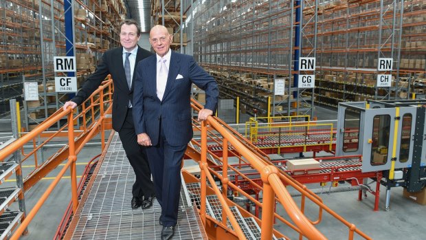 Premier Investments chairman Solomon Lew, right, and chief executive Mark McInnes at the company's national distribution centre at Truganina.
