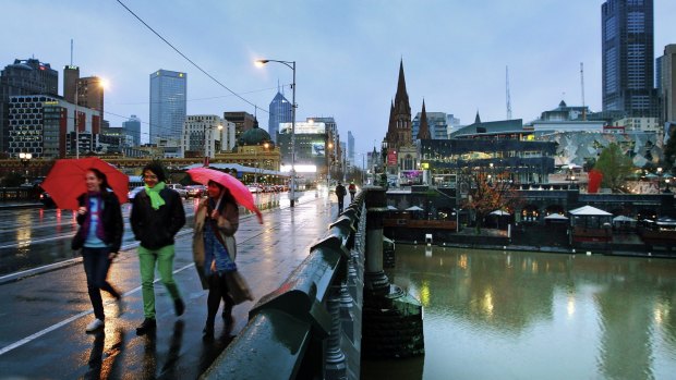 Grim and gloomy: Melbourne only reached 17.3 degrees on Sunday.