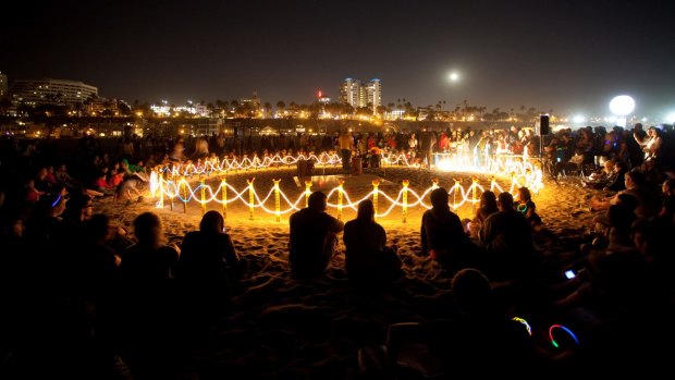 An installation on the beach at the Glow Festival.