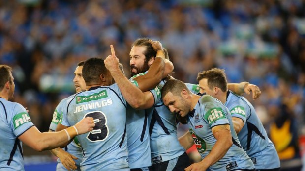 G whiz: Aaron Woods and the Blues celebrate victory in Melbourne in 2015.