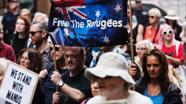 Protesters rally in Hyde Park against the Australian government's refusal to bring refugees on Manus Island to Australia. 
