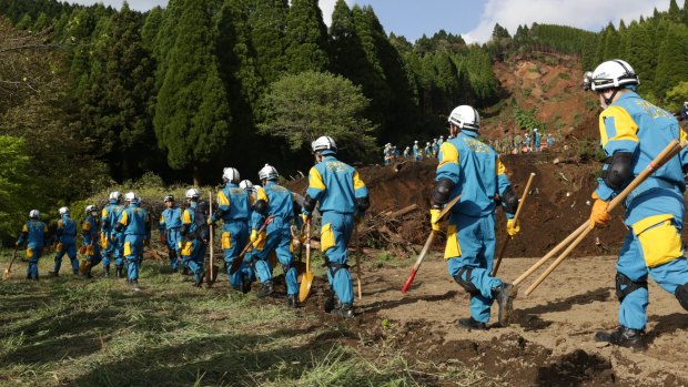Rescue teams prepare to search for quake survivors in Kumamoto, Japan. 