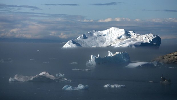 Icebergs float in the Jacobshavn Bay on August 24, 2007 near the town of Ilulissat, Greenland.  Recent scientific reports have documented apparently accelerating ice loss from Greenland.