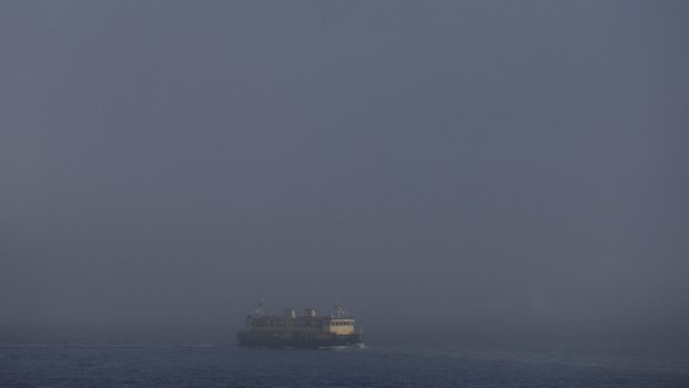 Early morning fog on Sydney Harbour. 