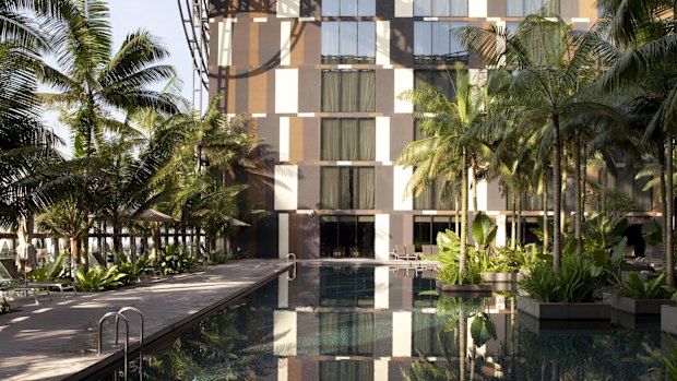 The swimming pool, surrounded by tropical gardens, at the Crowne Plaza Changi.