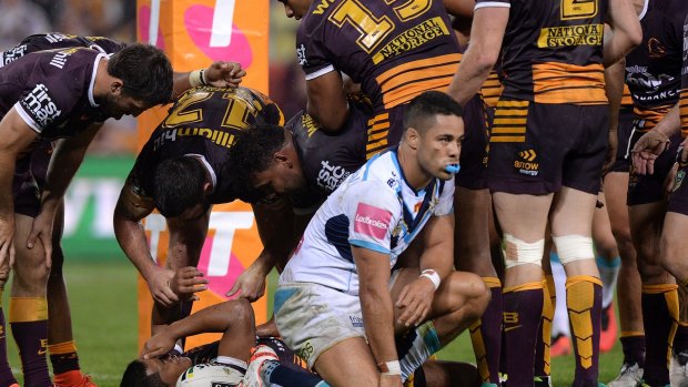 Costly error: Jarryd Hayne's spill at the start of the second half opened the floodgates for the Broncos. 