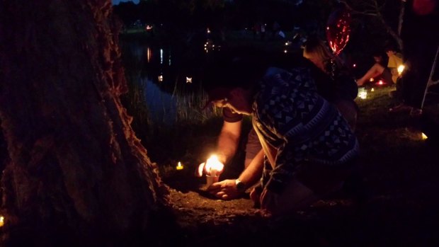 Hundreds gathered for a candlelight vigil at a Landsdale lake to pay tribute to two-year-old Sam Trott.