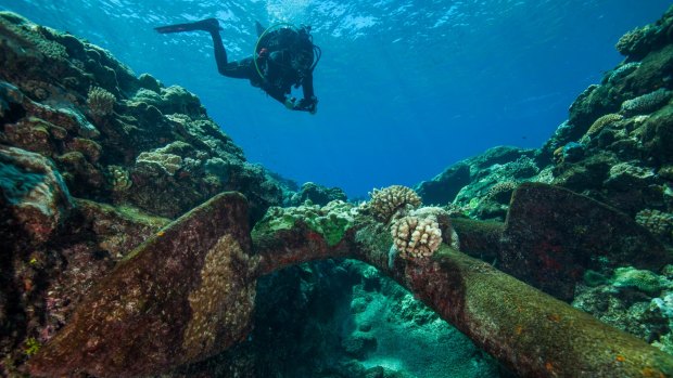 Australian National Maritime Museum maritime archaeologist Dr James Hunter photogrammetrically records an anchor on one of the shipwreck sites discovered at Kenn Reefs.
